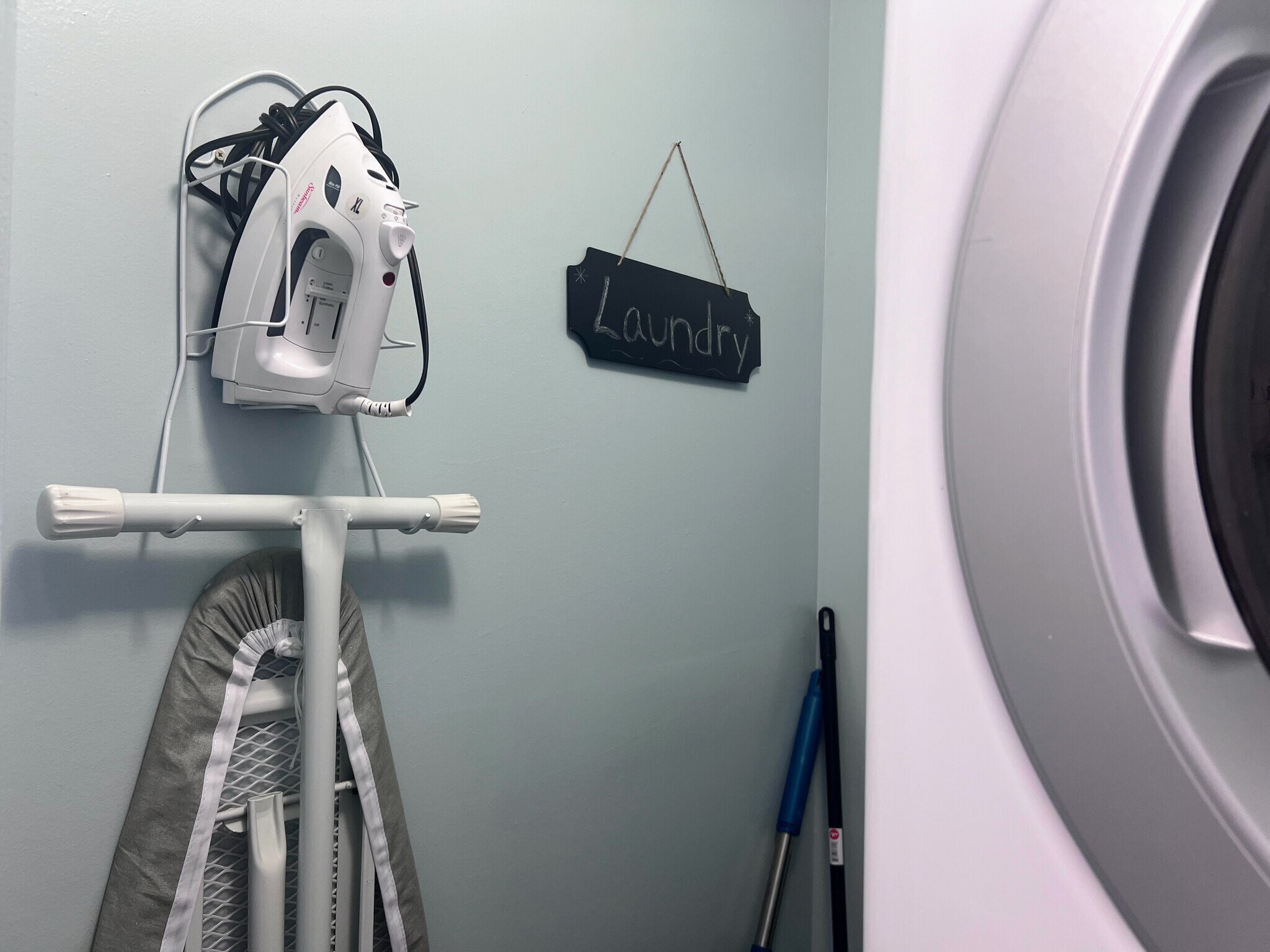 Iron & iron board - 10625 Front Beach Rd