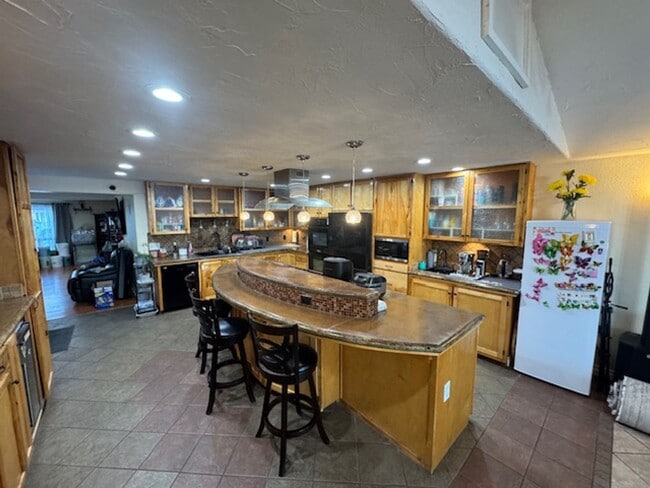 Building Photo - Beautifully Remodeled 4 bedroom off the River in town