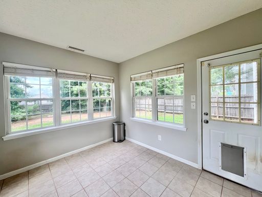 Building Photo - Charming 4BD, 2.5BA Durham Home with a Bonus Sun-Room & Fenced In Yard Only 10 Minutes Away from ...