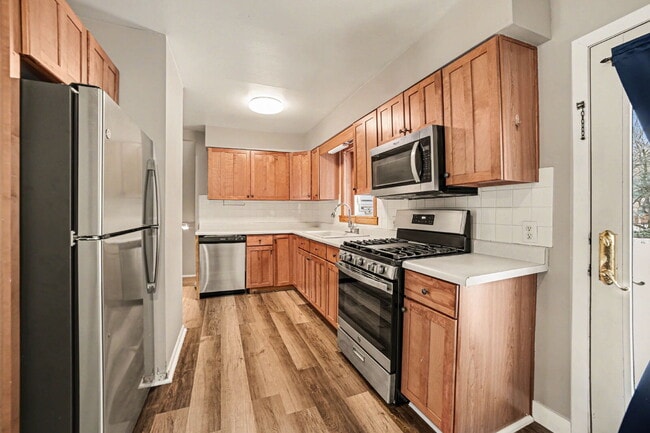 Building Photo - Updated- Well Maintained 3 bedroom Rental Home- $1650/Month