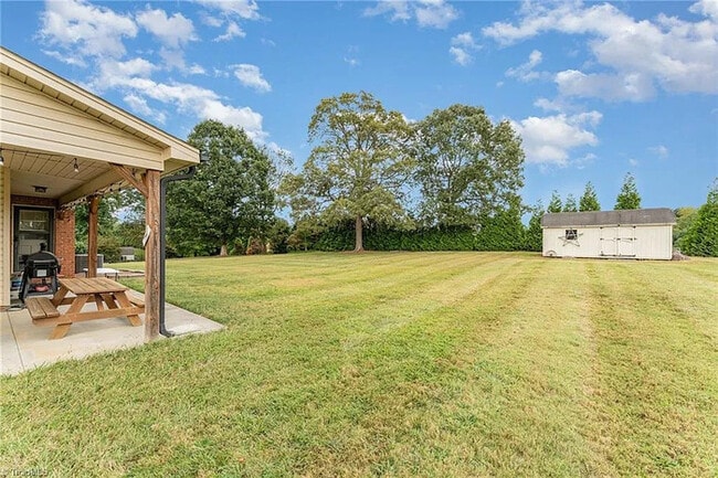 Building Photo - Earn Wealth While Leasing - Like a Homeown...