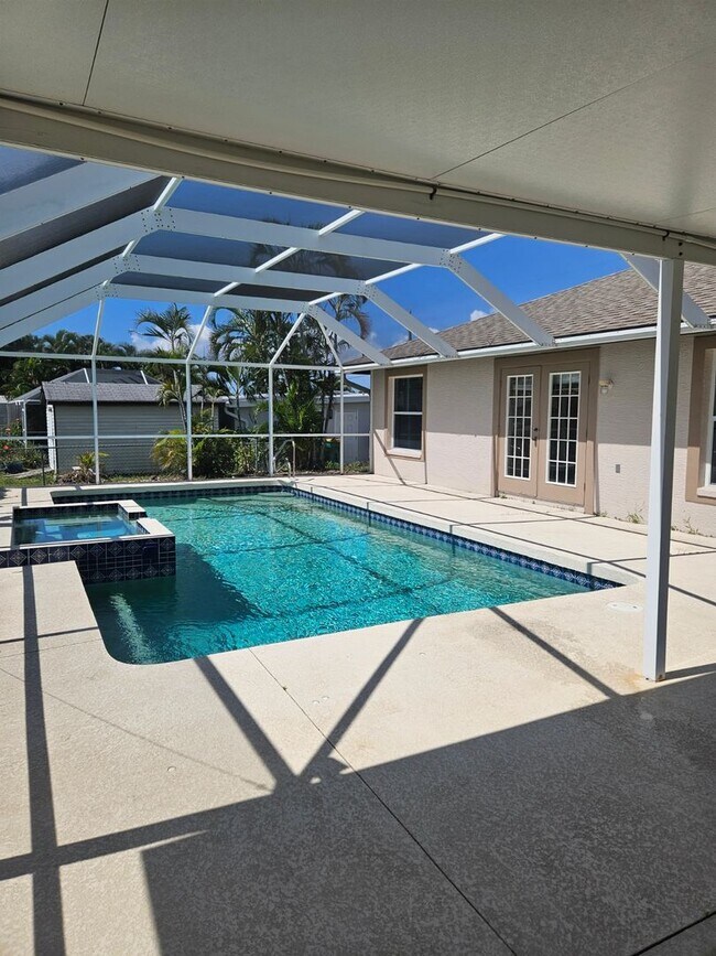 Building Photo - Port Charlotte Waterfront salt water pool annual rental