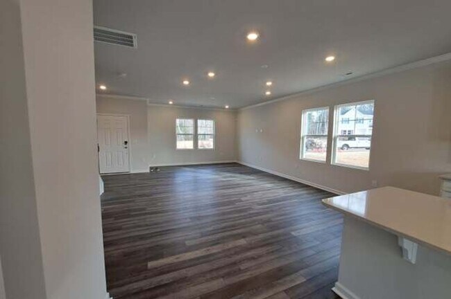 Building Photo - 3 BR/2.5BA | Newly Renovated Townhome End Unit | Private Patio| In Raleigh!