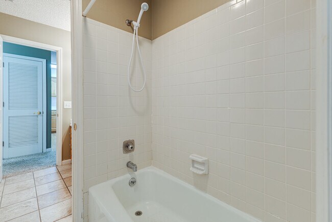 Shared tub/shower between the half baths - 760 Fox Ridge Dr