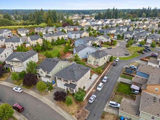 Building Photo - Spacious Spanaway Home w/ A/C & 5 Bedrooms...