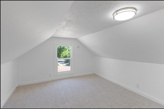 Building Photo - Updated South Omaha Home with Oversized Ga...