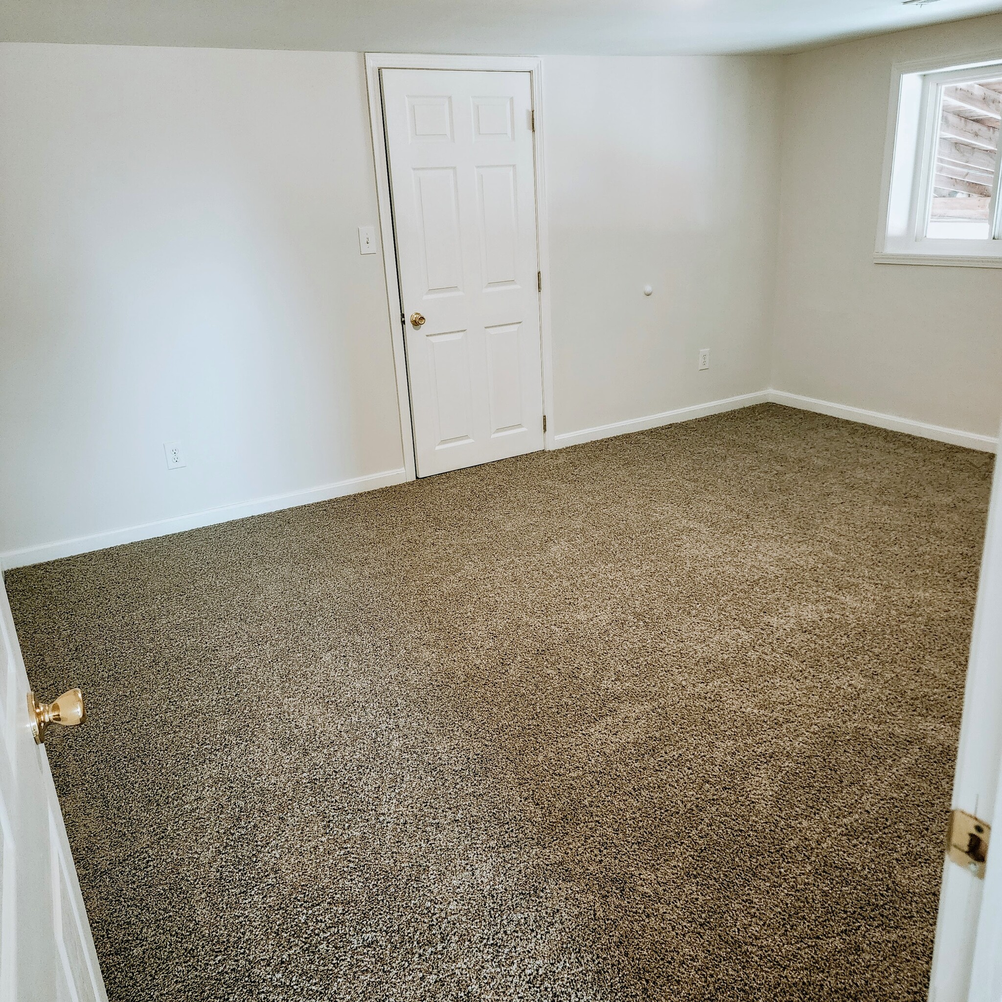 Bedroom #1 with built in bookshelves and walk-in closet - 882 N Base Rd