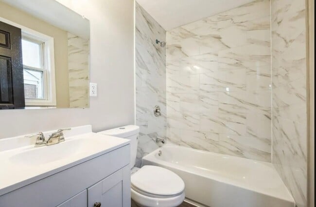 Building Photo - Fully Renovated Two-Bedroom Townhome In Du...