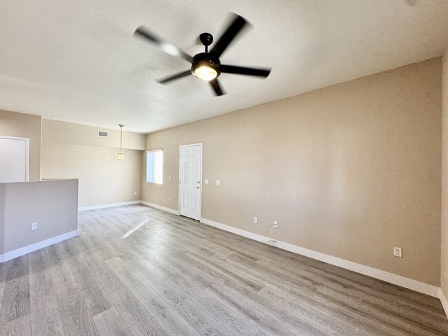 Building Photo - DOWNSTAIRS CONDO | GATED COMMUNITY | CENTENNIAL HILLS | UPDATED 3 BEDROOM