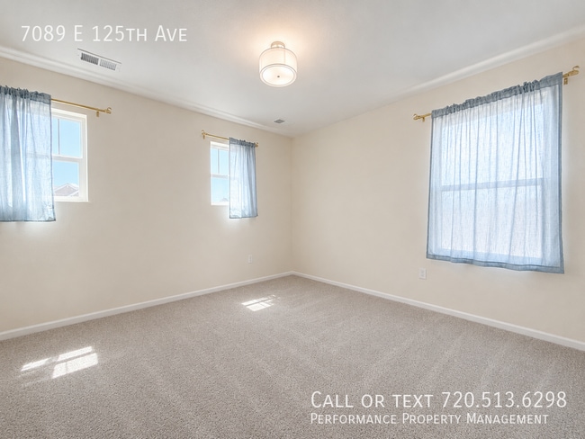 Building Photo - 7089 E 125th Ave
