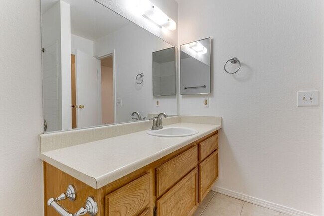 Building Photo - Charming 2 Bed, 2 Bath Condo with Fireplace & Balcony! 89011