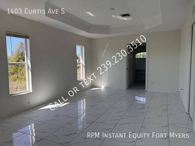 Building Photo - 1403 Curtis Ave S