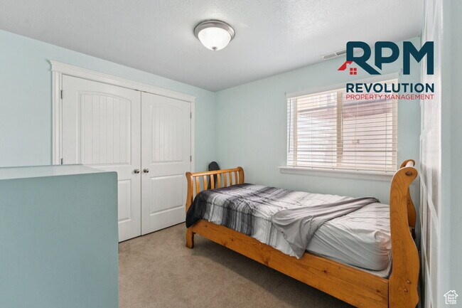 Building Photo - "Spacious 6-Bed Gem with Granite Touches & Cozy Fireplace in Morgan!"