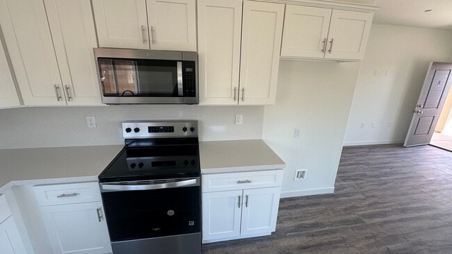 Building Photo - Coyote Run Duplexes 6000