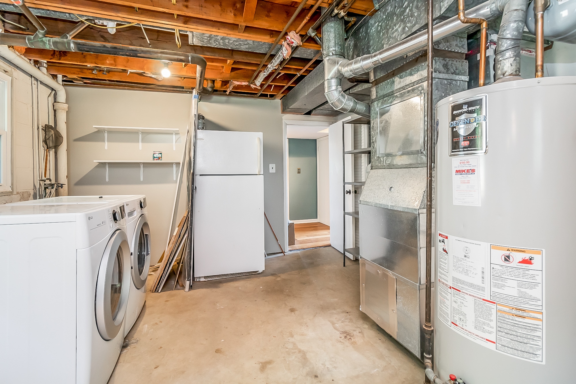 updated laundry with tons of storage - 8727 Valleyfield Rd