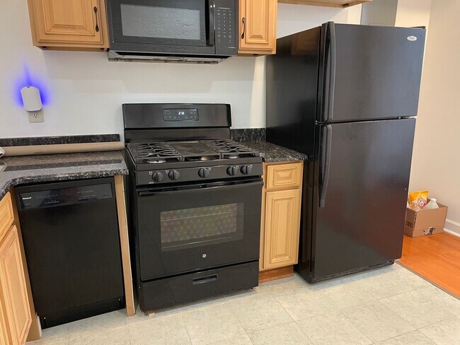 Building Photo - Charming 2-Bedroom, 1.5-Bathroom Brick Townhouse in Pigtown