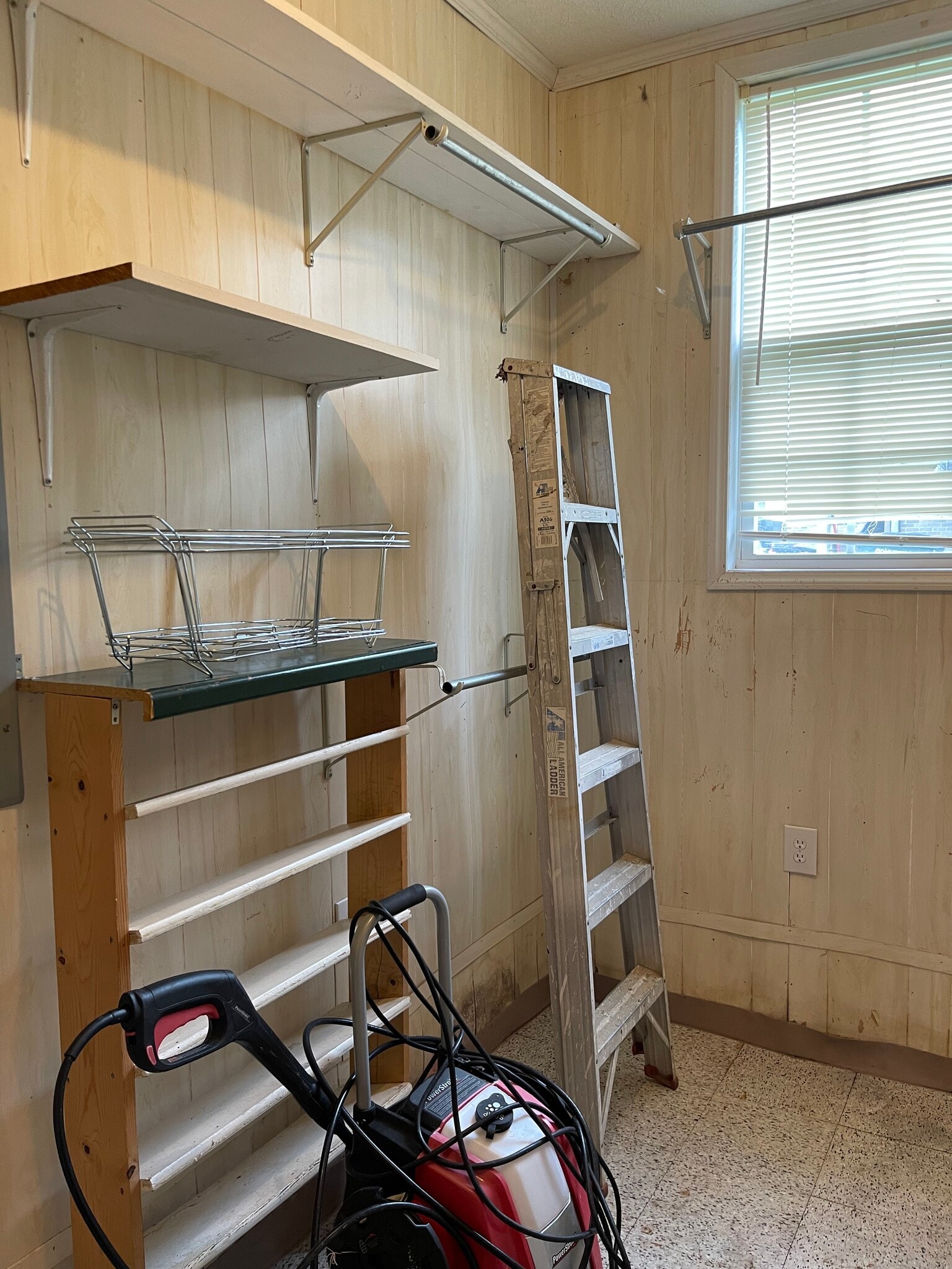 Utility has convenient storage racks and shelves - 512 Madison Ave