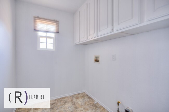 Building Photo - A Captivating and Charming 2 Story Home Ne...