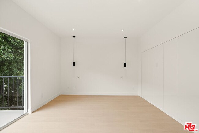 Building Photo - 10630 Wilkins Ave