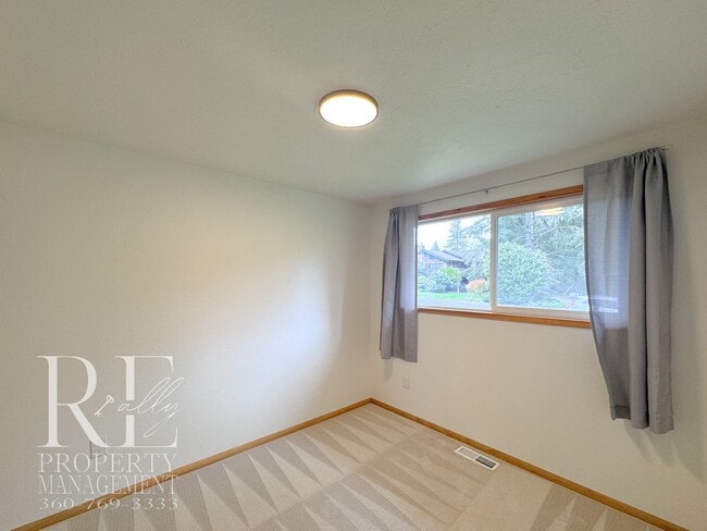 Building Photo - Bright & Spacious Single-Level Home with Dual Living Areas