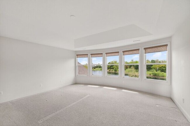 Building Photo - Modern Luxury with Waterfront Views in West Carmel
