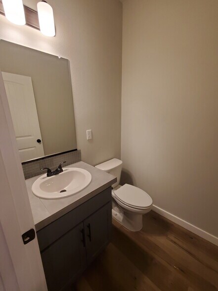The downstairs half bath - 161 E Wayno Way