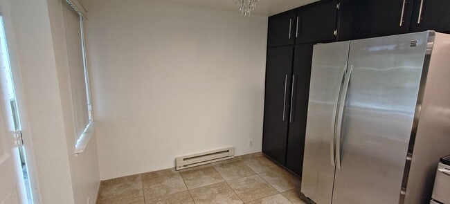Building Photo - Modern 1BR/1BA Condo Available Now