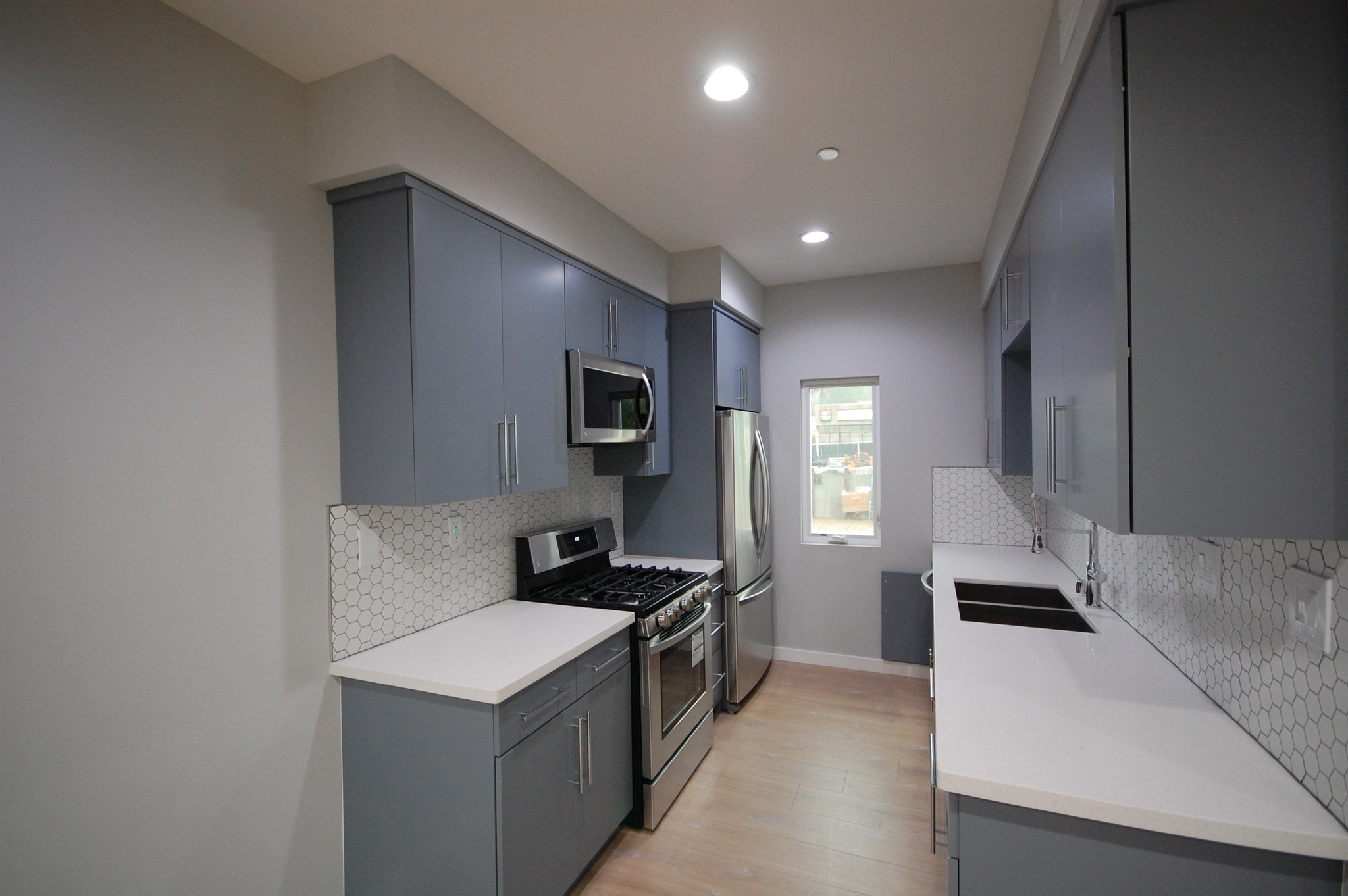 GALELY KITCHEN NEW FLOORING - 646 N Serrano Ave