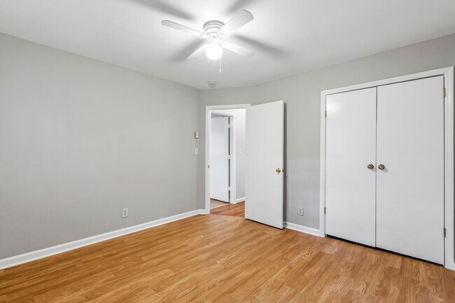 Building Photo - Updated Home, Stainless Steel Appliances, Wood Like Flooring, Deck, Garage!