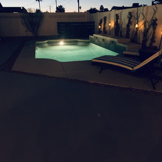 Backyard pool in evening - 8516 E Vernon Ave