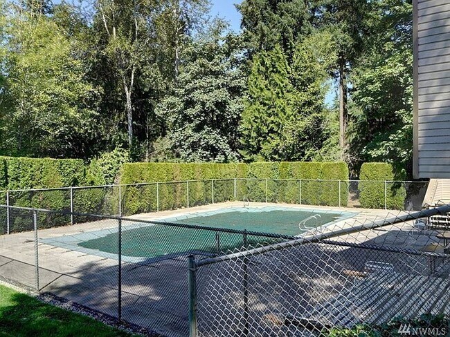 Building Photo - Spacious 2 bedroom 1.75 bath condo Racquet...