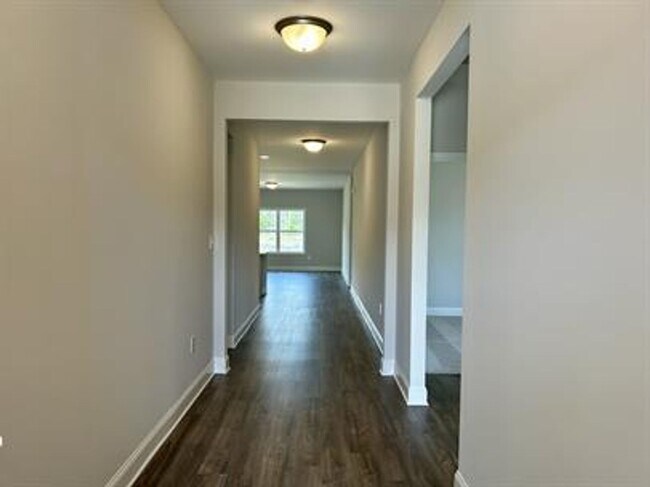 Building Photo - Relax & Unwind in This Peaceful 4 Bedroom ...