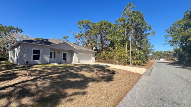 Building Photo - Spacious 4BR Home with Well Water, Pet-Friendly & No HOA