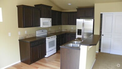 Building Photo - NE 3 Bdrm Home, All Appliances, Gas Heat, ...