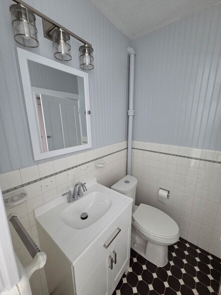 Enclosed vanity and medicine cabinet - 146 E 2nd St
