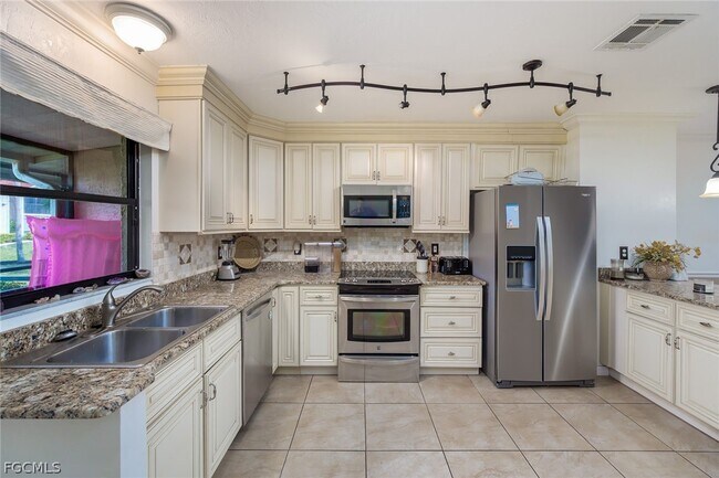 Building Photo - 9639 Eaton Gardens Ln