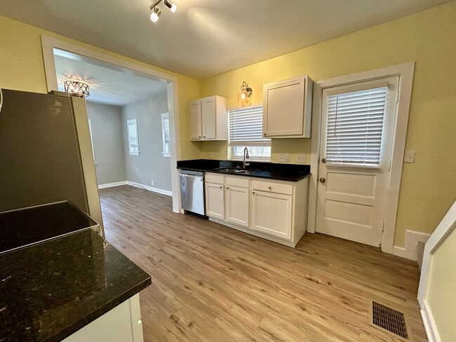 Building Photo - DELHI TWP- Spacious 4 bedroom 3 bath Cape Cod with garage