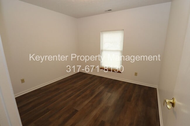 Building Photo - Discover this well-maintained 3-bedroom, 2-bath home in Indianapolis featuring an attached garage...