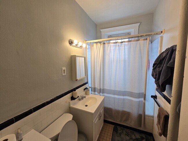 Building Photo - Close to T - Pet Friendly - On site laundry