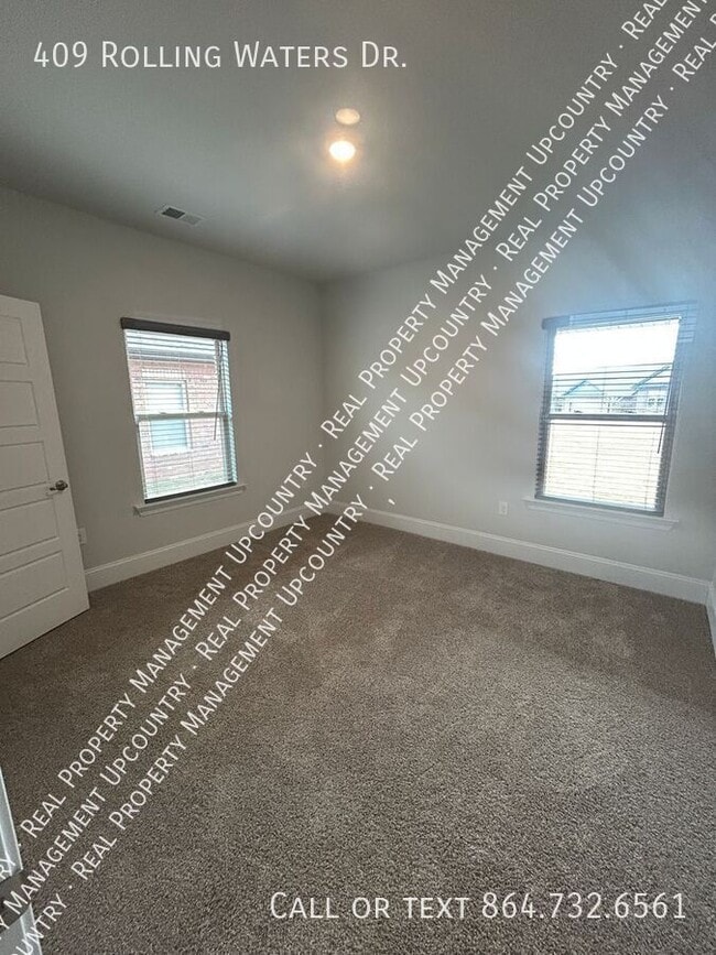 Building Photo - 409 Rolling Waters Dr