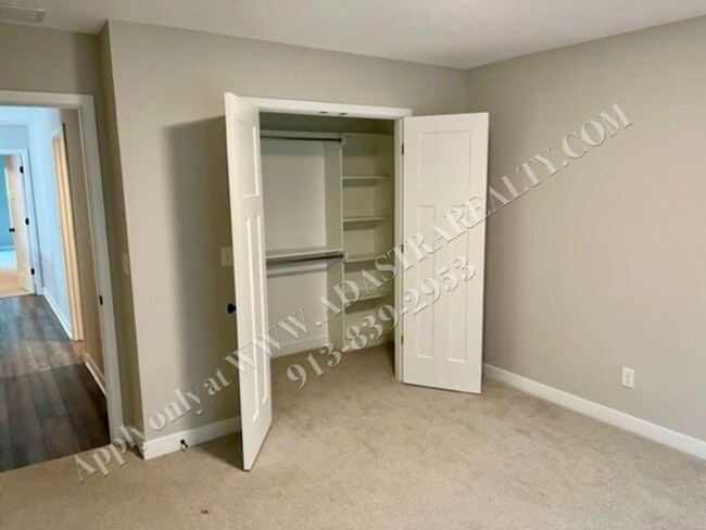 Building Photo - Spacious 4-Bedroom Townhome with Finished Basement in Blue Valley School District-Coming SOON!!