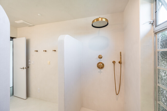 Downstairs Tedelakt plaster bathroom with Kohler finishes - 7401 Studio Rd