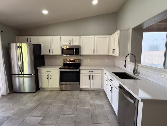 Building Photo - REMODELED 3 Bedroom 2 Bathroom EAST MESA HOME NO CARPET