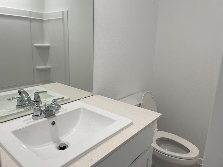 Bathroom with tub and shower - 25665 Rose Creek Dr