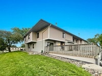 Building Photo - Spacious End-Unit Townhome with Fireplace, Family Room, 2-car Garage, Community Pool & Playground...