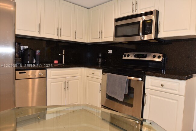 Building Photo - 5555 Collins Ave