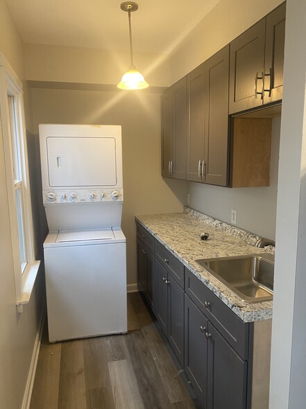 Kitchen with washer and dryer - 134 Shelton Ave