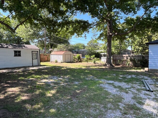 Building Photo - Step into this beautifully updated 1950's gem, where charm meets modern convenience