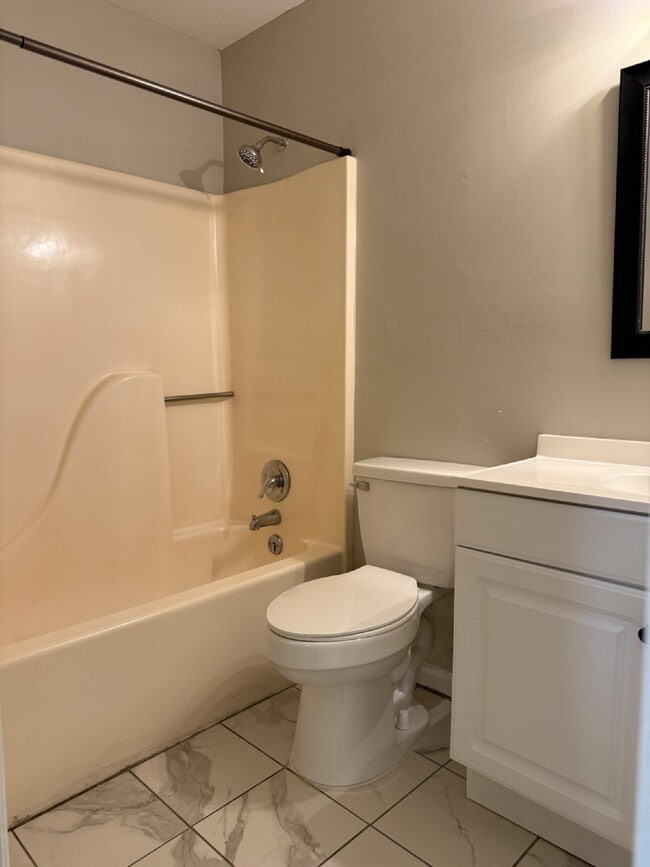 Building Photo - "Cozy 2-Bed Condo in Huntsville with Firep...