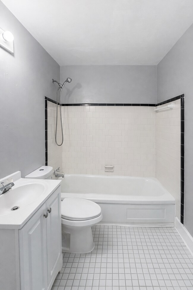 Building Photo - Home with Modern Kitchen, Finished Basement & Backyard Deck